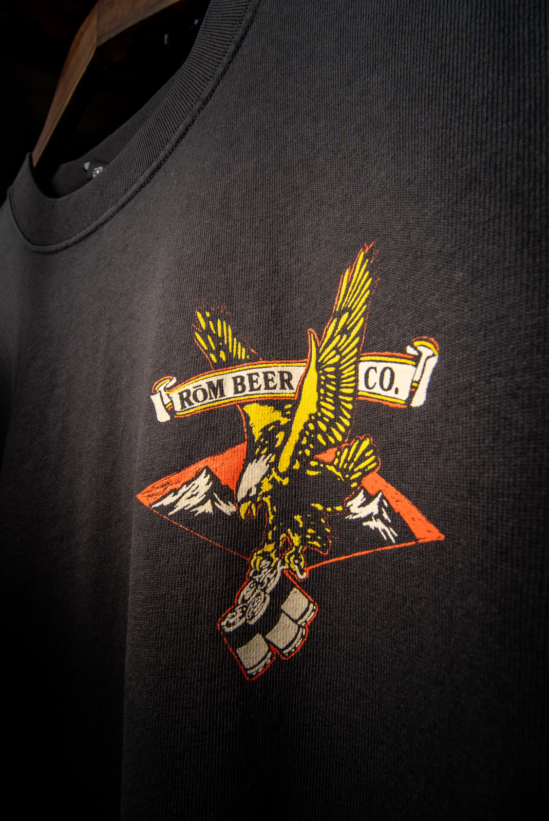 A close-up of the artwork on RŌM Beer Co. apparel.